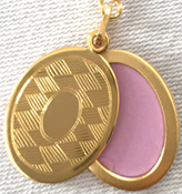 SL8033 oval slide locket